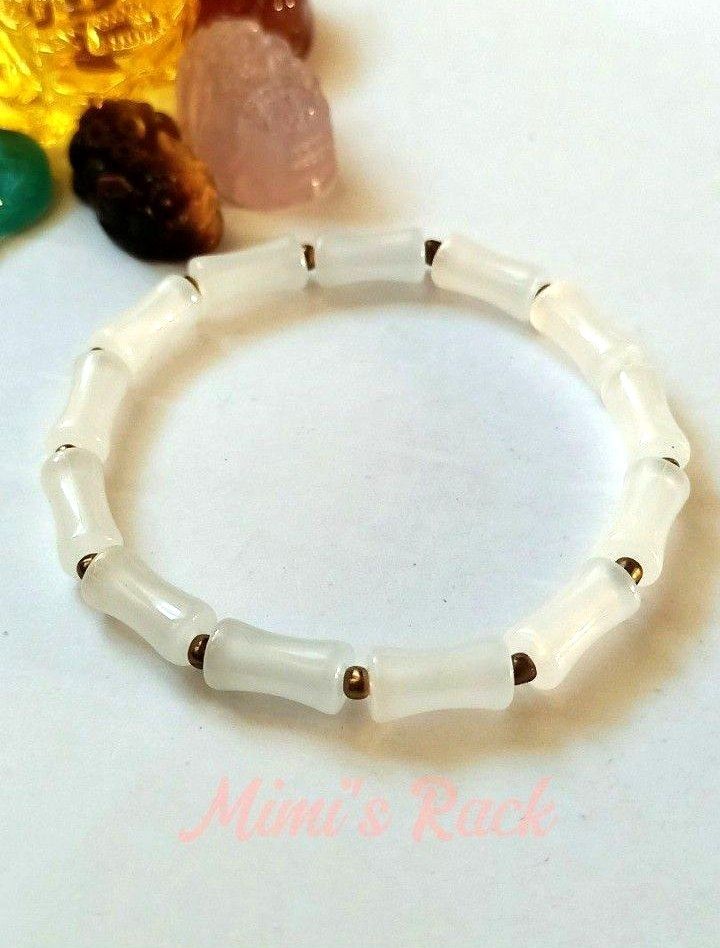 WHITE CHALCEDONY BAMBOO DESIGN BRACELET (Category: Bracelets) located in Taguig. Submitted by mimisrack (Listing ID 1468695488, Image 2). Description: 🤍Clean look with meaningful design. -Bamboo design symbolizing growth and resilience -Smooth polished bracelet for everyday wear -Chalcedony is associated with calm energy and emotional balance -A simple and elegant bracelet perfect for daily styling 🧿 Bead size: 6x13mm 🧿 wrist size: 16cm (or ca