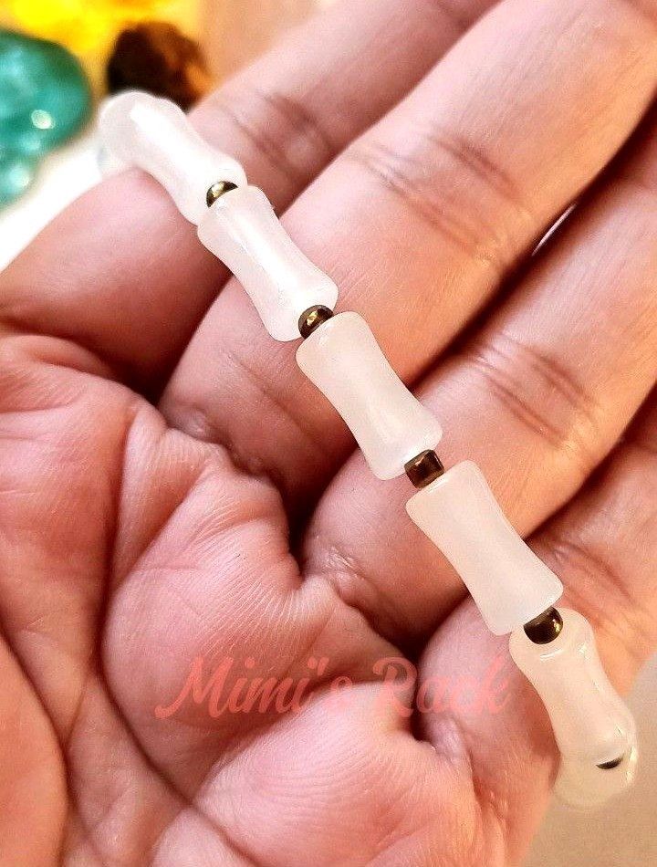 WHITE CHALCEDONY BAMBOO DESIGN BRACELET (Category: Bracelets) located in Taguig. Submitted by mimisrack (Listing ID 1468695488, Image 3). Description: 🤍Clean look with meaningful design. -Bamboo design symbolizing growth and resilience -Smooth polished bracelet for everyday wear -Chalcedony is associated with calm energy and emotional balance -A simple and elegant bracelet perfect for daily styling 🧿 Bead size: 6x13mm 🧿 wrist size: 16cm (or ca