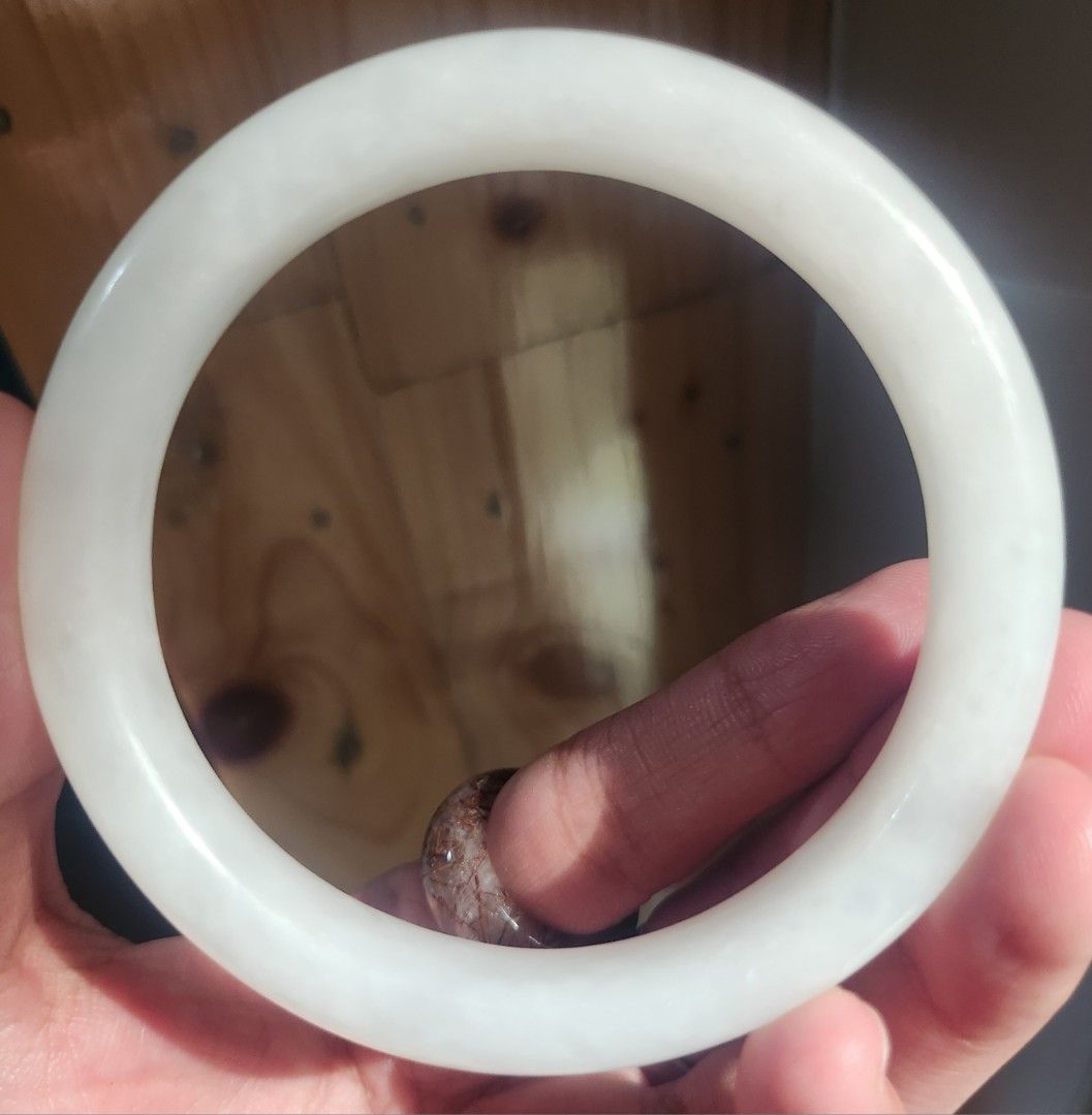 White Hetian Jade Bangle 57.9mm (Category: Bracelets) located in Baguio. Submitted by lausgem2026 (Listing ID 1468504762, Image 2). Description: -White Hetian Jade/Nephrite Bangle -57.9mm diameter size. 12mm thickness. -Note: has cotton. -Comes with free box. No certificate. -Location: Baguio City.
