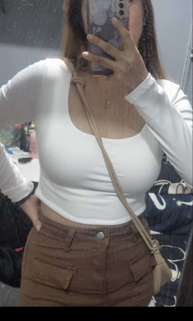 White Square Neck Long Sleeve Crop Top (Large Size) (Category: Longsleeves) located in Paranaque City. Submitted by shopmycloset_pretty.mercy (Listing ID 1468534656, Image 3). Description: - Color: White - Style: Long sleeve crop top with a trendy square neckline - Fit: Fitted, hits right above the waist - Material: Soft and stretchy fabric for all-day comfort - Versatility: Perfect everyday basic that pairs easily with jeans or skirts - Sizing: 