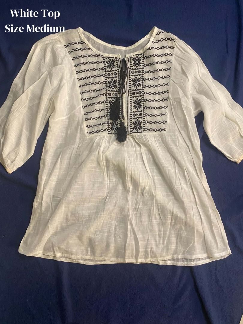 White Top Size Medium (Category: Blouses) located in Santa Cruz, Pampanga. Submitted by jncthriftshop (Listing ID 1468633786, Image 1). Description: Please note that this item is pre-loved and not brand new. It may have minor signs of use, such as small stains, loose threads, slight fading, or other minor imperfections. Please manage your expectations and check all photos carefully before purchasing. -Condition: Pre-loved / Secondhand -Minor flaw