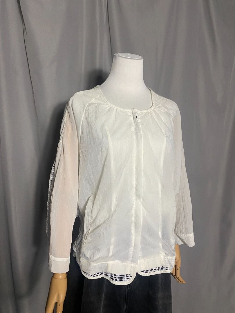 White windbreaker, net jacket (Category: Longsleeves) located in Las Pinas. Submitted by ipickyou (Listing ID 1468677889, Image 3). Description: Unwashed Condition: 10/10 𝗠𝗲𝗮𝘀𝘂𝗿𝗲𝗺𝗲𝗻𝘁𝘀 𝘄𝗵𝗲𝗻 𝗹𝗮𝗶𝗱 𝗳𝗹𝗮𝘁: -Armpit to armpit: 23” -Length: 24F, 27B” .