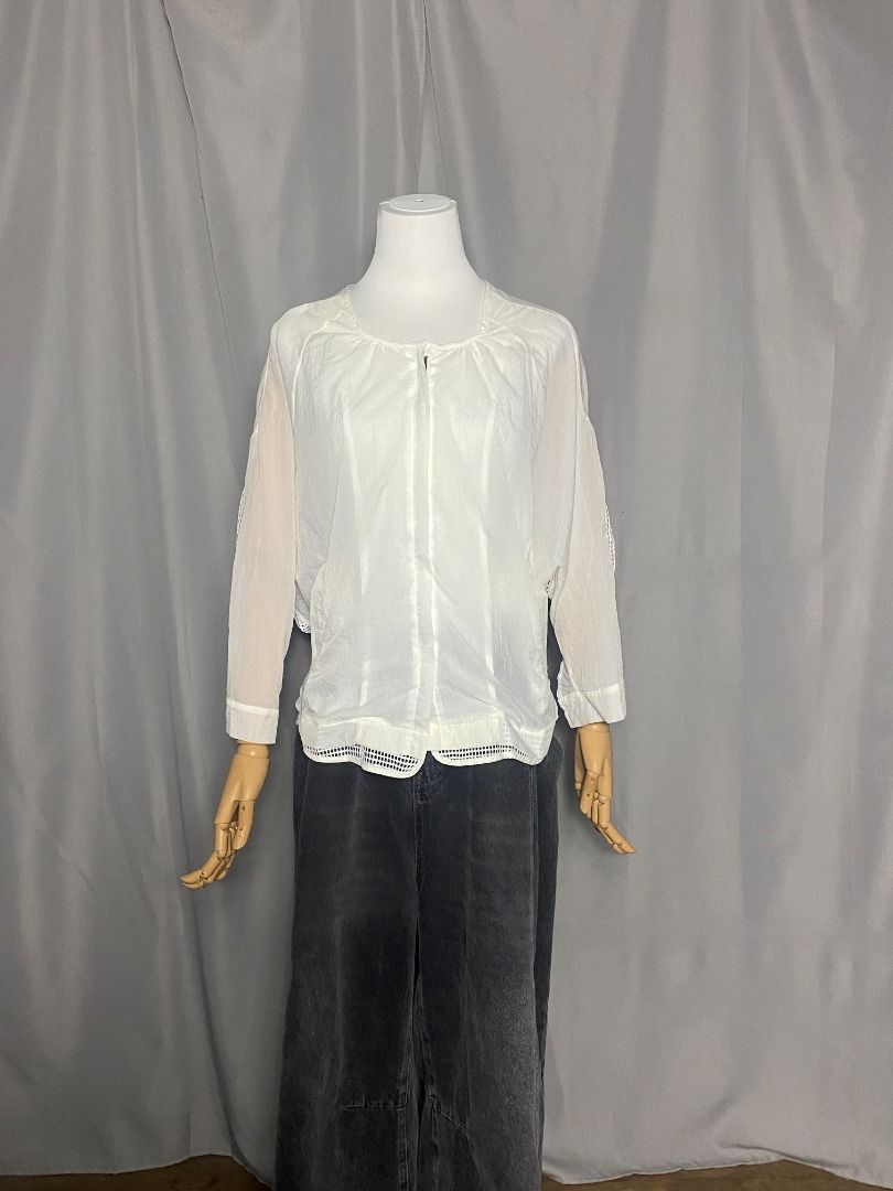 White windbreaker, net jacket (Category: Longsleeves) located in Las Pinas. Submitted by ipickyou (Listing ID 1468677889, Image 2). Description: Unwashed Condition: 10/10 𝗠𝗲𝗮𝘀𝘂𝗿𝗲𝗺𝗲𝗻𝘁𝘀 𝘄𝗵𝗲𝗻 𝗹𝗮𝗶𝗱 𝗳𝗹𝗮𝘁: -Armpit to armpit: 23” -Length: 24F, 27B” .