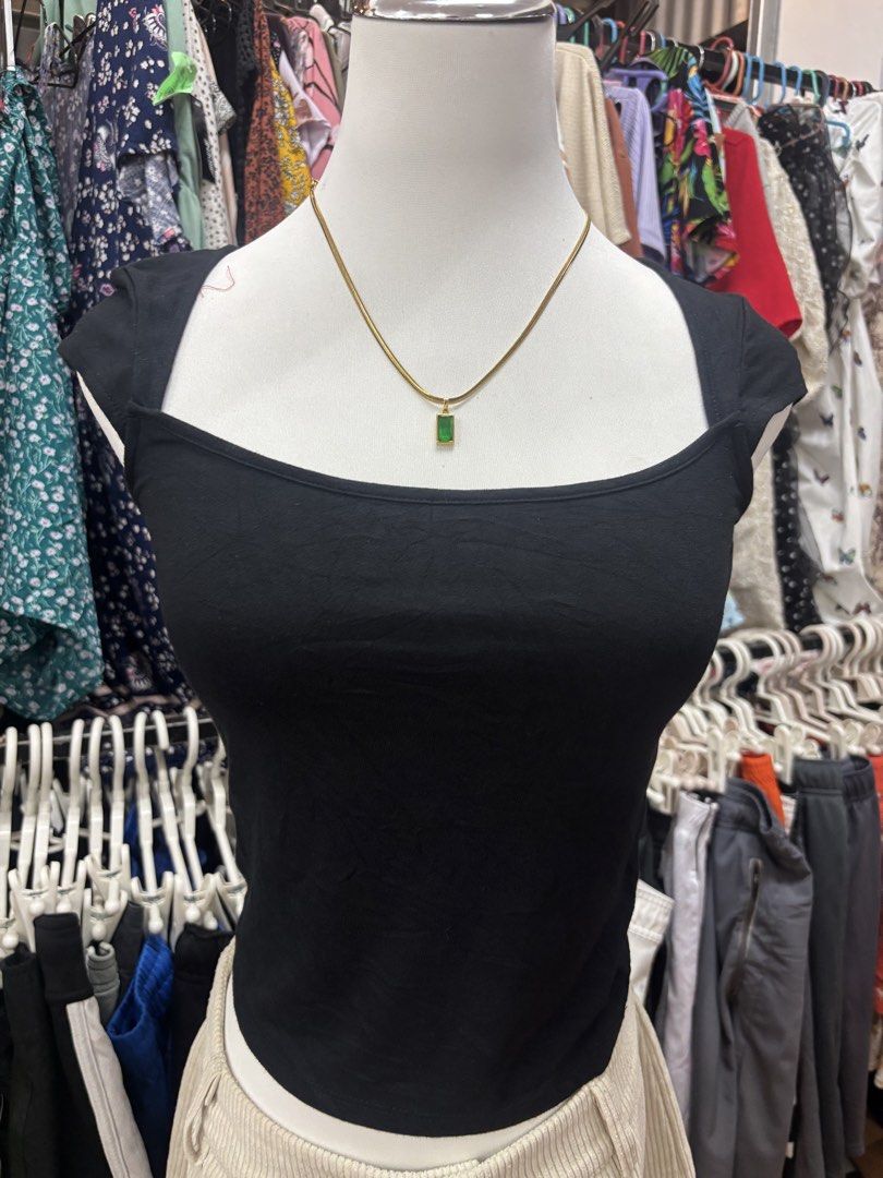 Wild Fable Black Square Neck Tank Top (Category: Sleeveless) located in Alicia. Submitted by thriftbagph (Listing ID 1468636219, Image 1). Description: - Brand: Wild Fable - Size: XS - Color: Solid black (goes with everything!) - Style: Square neckline with cap sleeves - Material: 92% rayon, 8% spandex (super soft and stretchy) - Care: Machine washable.