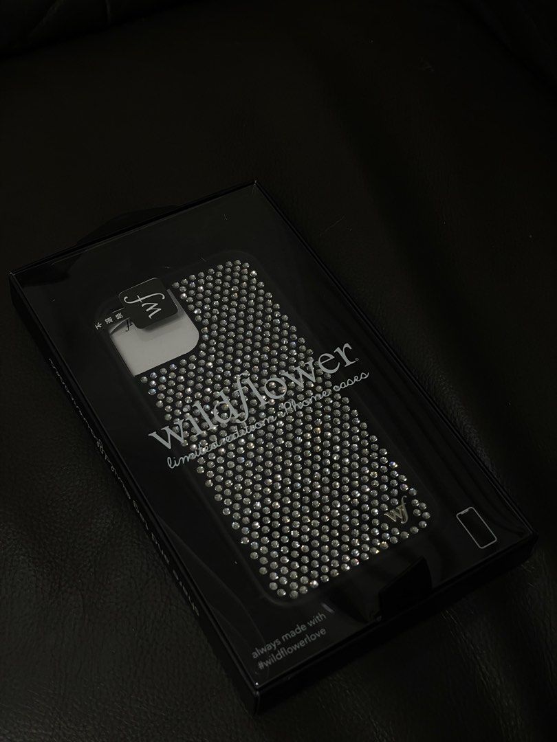 WILDFLOWER RHINESTONE CASE IP12 PRO (Category: Cases & Sleeves) located in Manila. Submitted by amberwinslow (Listing ID 1468612025, Image 1). Description: PRELOVED WILDFLOWER RHINESTONE WHITE BLACK GLITTER CASE FOR IPHONE 12 PRO NEGOTIABLE PRICE RUSH SELLING.