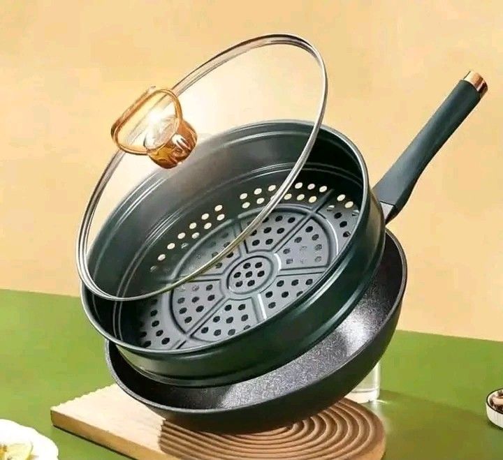 Wok pan w/ steamer (Category: Other Kitchen Appliances) located in Manila. Submitted by vanstar_c4c231 (Listing ID 1468561750, Image 2). Description: Available Wok pan w/ steamer pm me COD via lalamove may shipping fee.