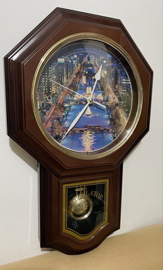 Wooden Wall Clock Regulator Pendulum (Category: Vintage Collectibles) located in Quezon City. Submitted by sissymissy1527 (Listing ID 1468641969, Image 3). Description: A scenic nighttime city Clock and pendulum working condition Chime- not working Needs 2pcs AA basi at wala naman chime. Kapag meron 2pcs needed. Batteries not included Selling as is where is.