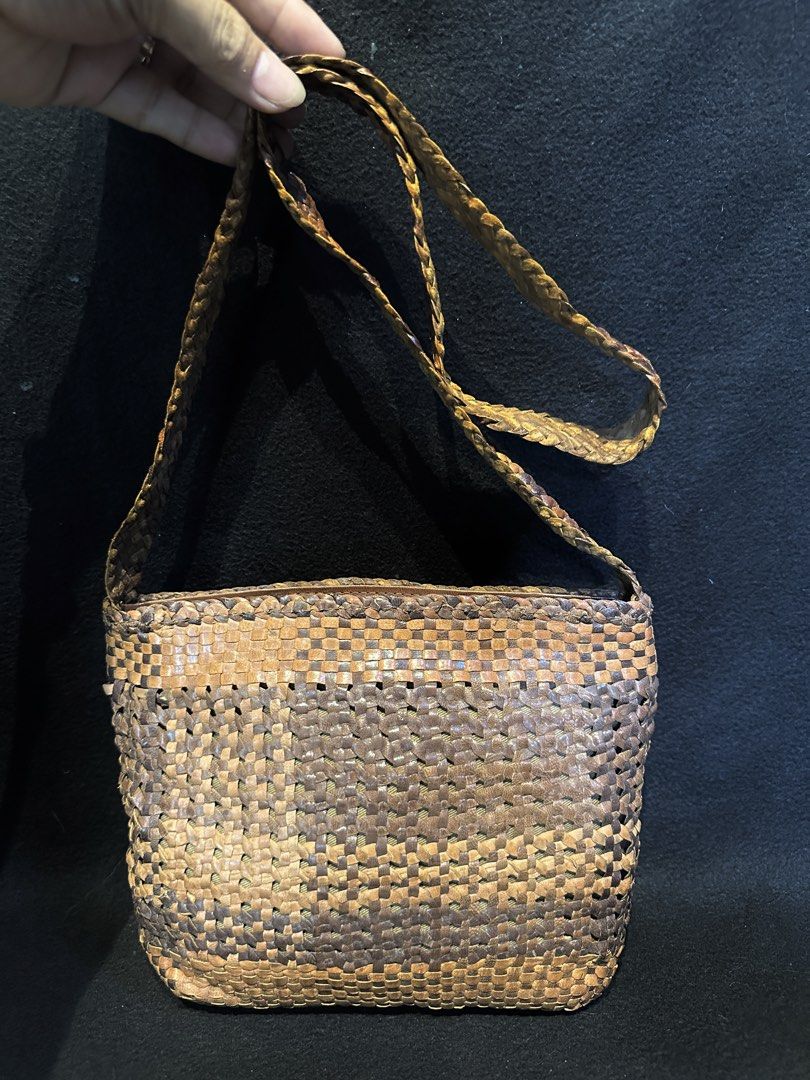 Woven Genuine Leather shoulder bag (Category: Luxury Bags & Wallets) located in Quezon City. Submitted by WIMC2ndaccount (Listing ID 1468579366, Image 3). Description: Japan bag Vintage bag Genuine leather Good condition 22 X 19 cm Shoulder bag .
