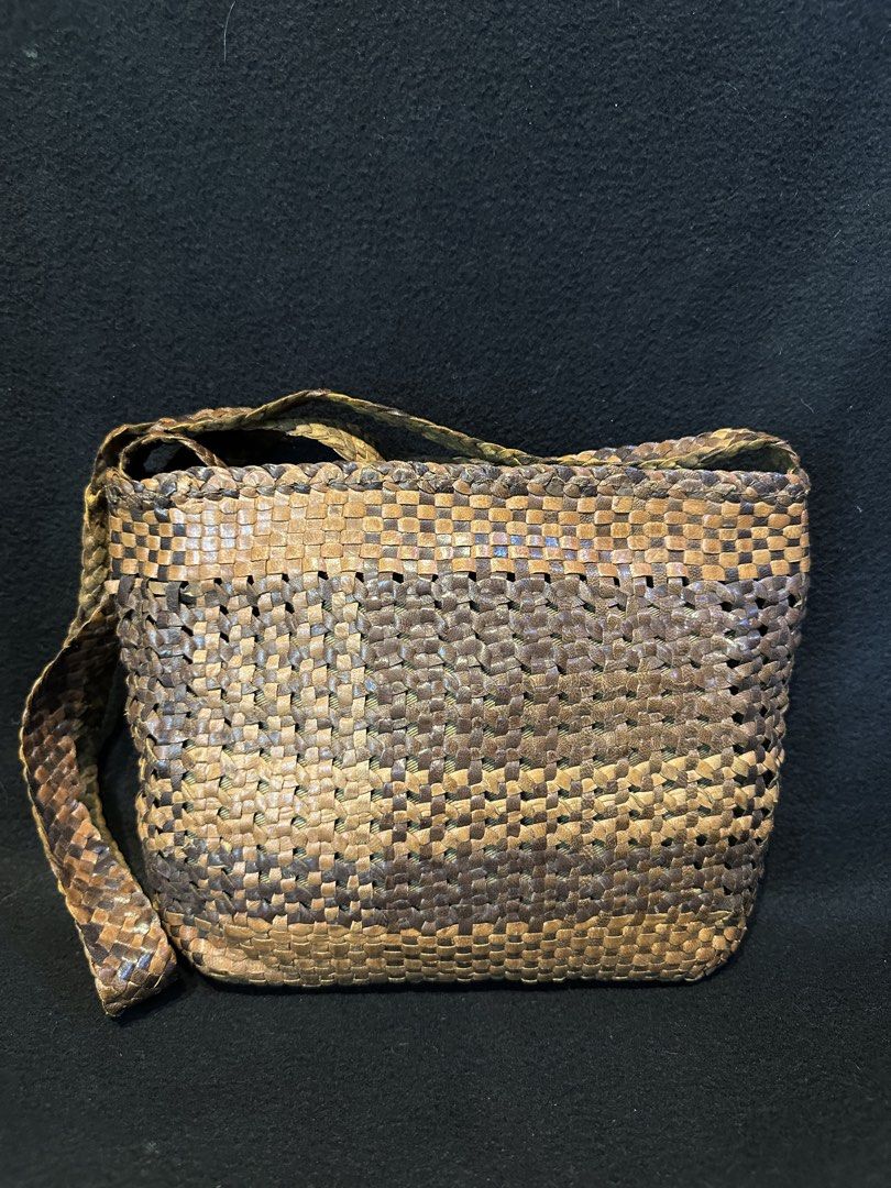 Woven Genuine Leather shoulder bag (Category: Luxury Bags & Wallets) located in Quezon City. Submitted by WIMC2ndaccount (Listing ID 1468579366, Image 2). Description: Japan bag Vintage bag Genuine leather Good condition 22 X 19 cm Shoulder bag .