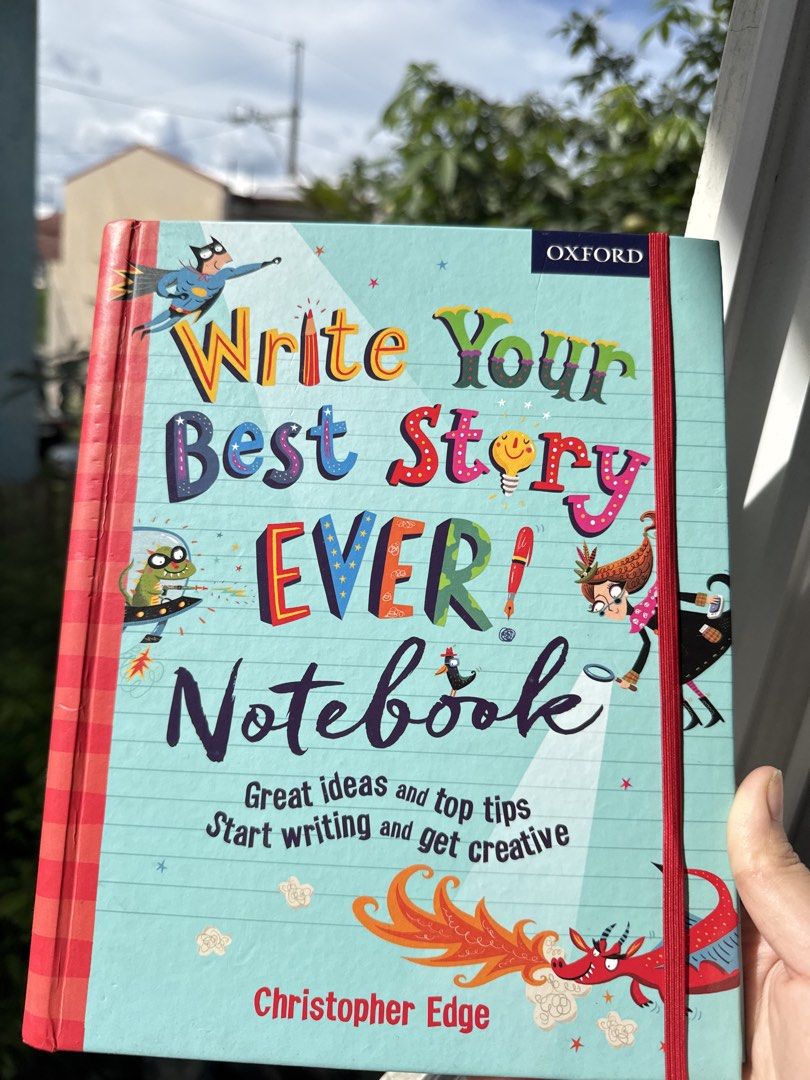 Write Your Best Story Ever Notebook Christopher Edge (Category: Storybooks) located in Pasig City. Submitted by goodbuy_02 (Listing ID 1468557955, Image 1). Description: - Publisher: Oxford - Features: Character creation, creative vocabulary, plotting, and story sparks - Design: Spiral-bound spine with a secure red elastic band closure - Ideal for: Kids and young aspiring writers looking for creative writing prompts and tips - If lalamove or inst