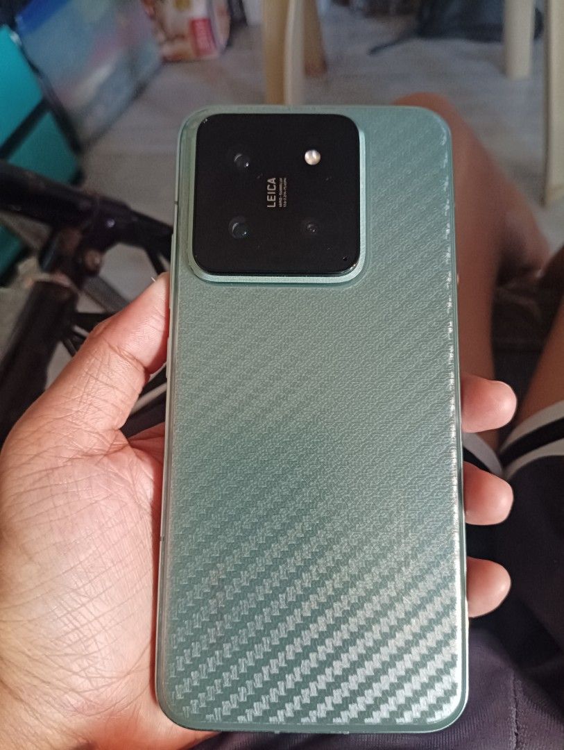 XIAOMI 14 GLOBAL (Category: Xiaomi) located in Manila. Submitted by mimi_catt (Listing ID 1468646505, Image 2). Description: - Brand/Model: Xiaomi 14 Global - Color: Green - Camera: Leica branding visible on the rear module - Condition: Excellent physical condition, clean screen and body - Features: Sleek slim profile with responsive display 256gb GLOBAL UNIT and BOX NO ISSUE.