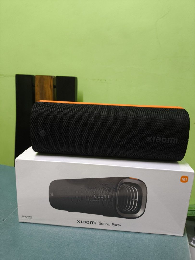 Xiaomi Sound Party Bluetooth Speaker (Category: Soundbars, Speakers & Amplifiers) located in Manila. Submitted by jamilarag34702 (Listing ID 1468526156, Image 1). Description: - Brand: Xiaomi Sound Party Wireless Speaker - Color: Black with a sleek orange accent stripe - Sound Quality: Harman AudioFX tuning on side drivers for immersive audio - Controls: Easy-to-use top strip buttons (Volume Up, Play/Pause, Volume Down, Power) - Packaging: Origin