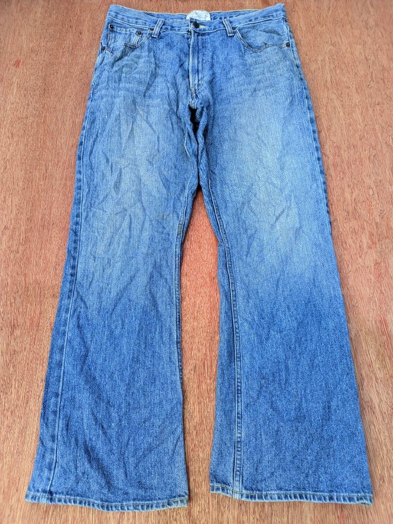 Y2k American Eagle men's bootcut (Category: Jeans) located in Kapalong. Submitted by hashhthrift (Listing ID 1468573661, Image 1). Description: issue needwash sign of usage actual measurements: waist 35 length 41 thigh 13 hem 10.