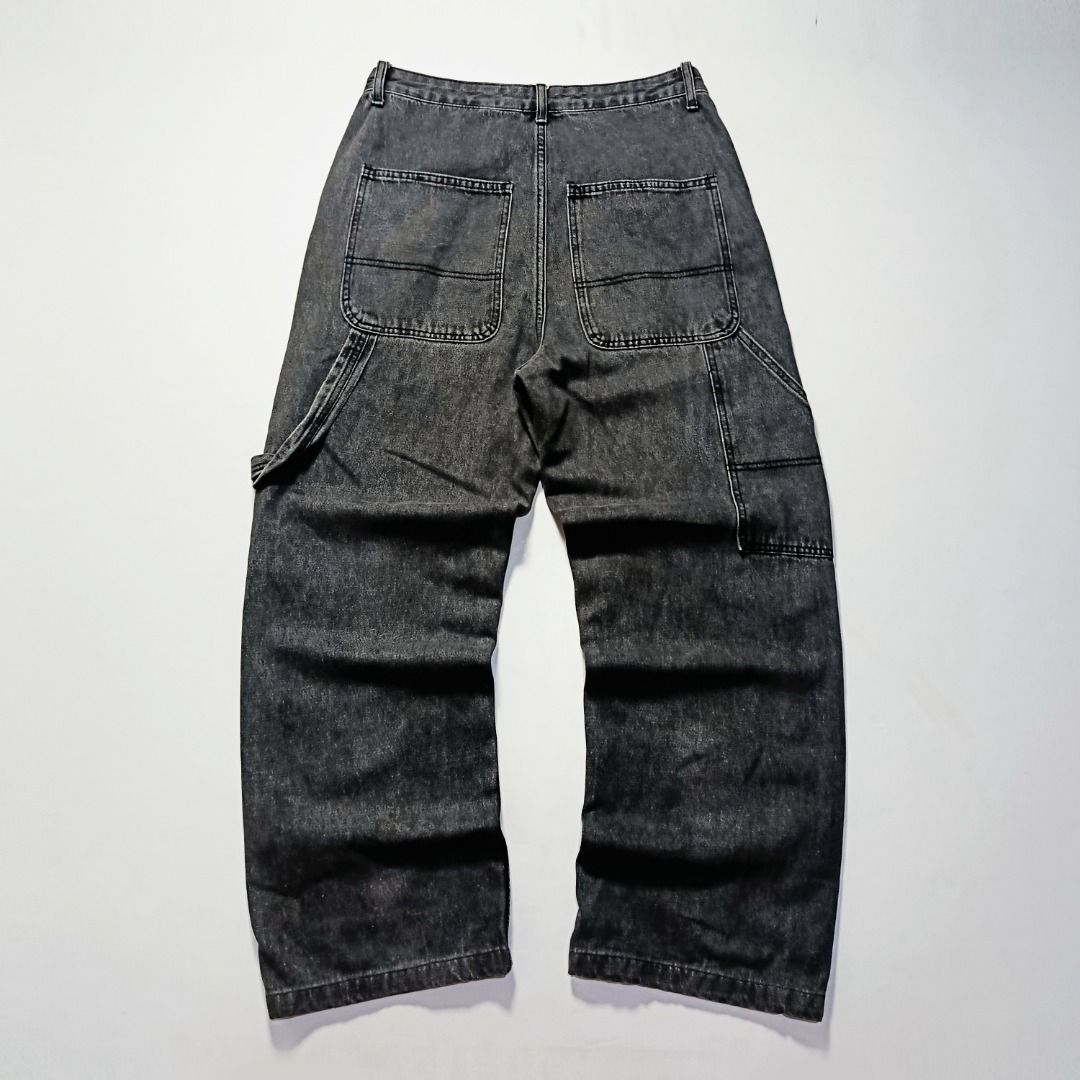 Y2K Double Knee Black Denim Carpenter Pants (Category: Jeans) located in Taytay. Submitted by hoodgrail.vtg (Listing ID 1468624594, Image 2). Description: • Excellent condition - Lightly used • Washed black denim with reinforced double-knee panels, rivet details, and a utility side loop • Size on tag: S — best fits W29 • Measurements: 15 x 39 in • Leg opening: 9 in • Color rate: 9/10 • Issue: None.