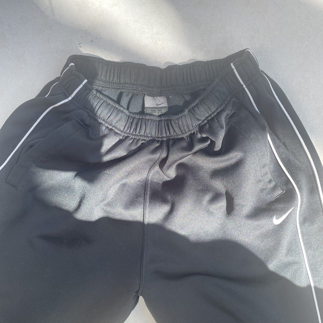 Y2K Nike Track Pants (Category: Joggers) located in Baguio. Submitted by 2ndstory.vntg (Listing ID 1468565891, Image 3). Description: Y2K NIKE TRACK PANTS🔥 Medium W: 28-32" L: 36.5" Excellent Condition 🔖₽500.00 📍Baguio City.