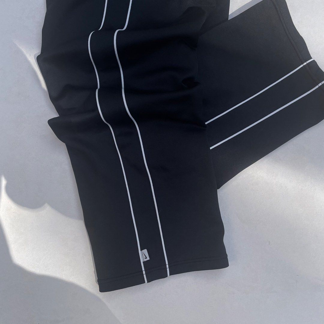 Y2K Nike Track Pants (Category: Joggers) located in Baguio. Submitted by 2ndstory.vntg (Listing ID 1468565891, Image 2). Description: Y2K NIKE TRACK PANTS🔥 Medium W: 28-32" L: 36.5" Excellent Condition 🔖₽500.00 📍Baguio City.