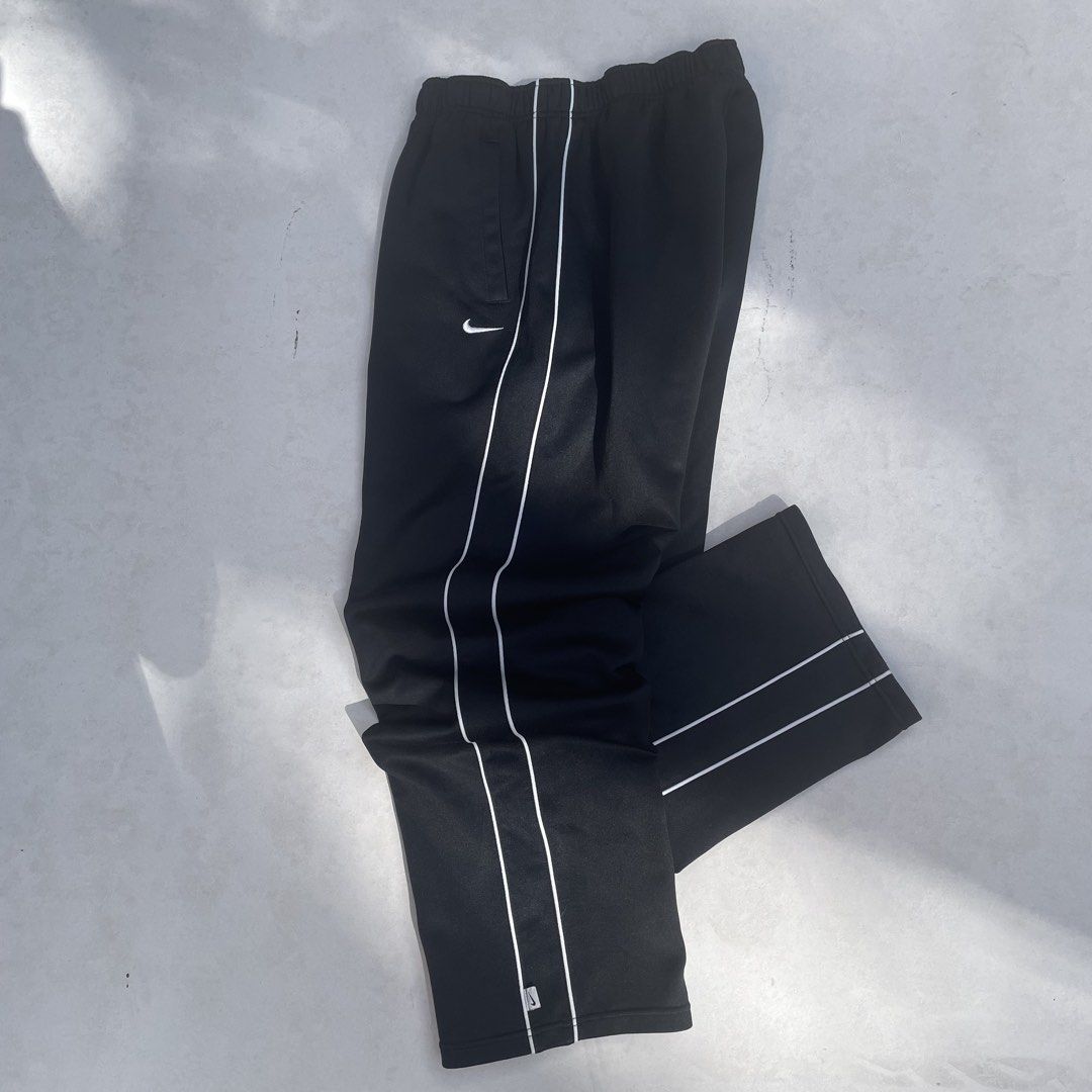 Y2K Nike Track Pants (Category: Joggers) located in Baguio. Submitted by 2ndstory.vntg (Listing ID 1468565891, Image 1). Description: Y2K NIKE TRACK PANTS🔥 Medium W: 28-32" L: 36.5" Excellent Condition 🔖₽500.00 📍Baguio City.
