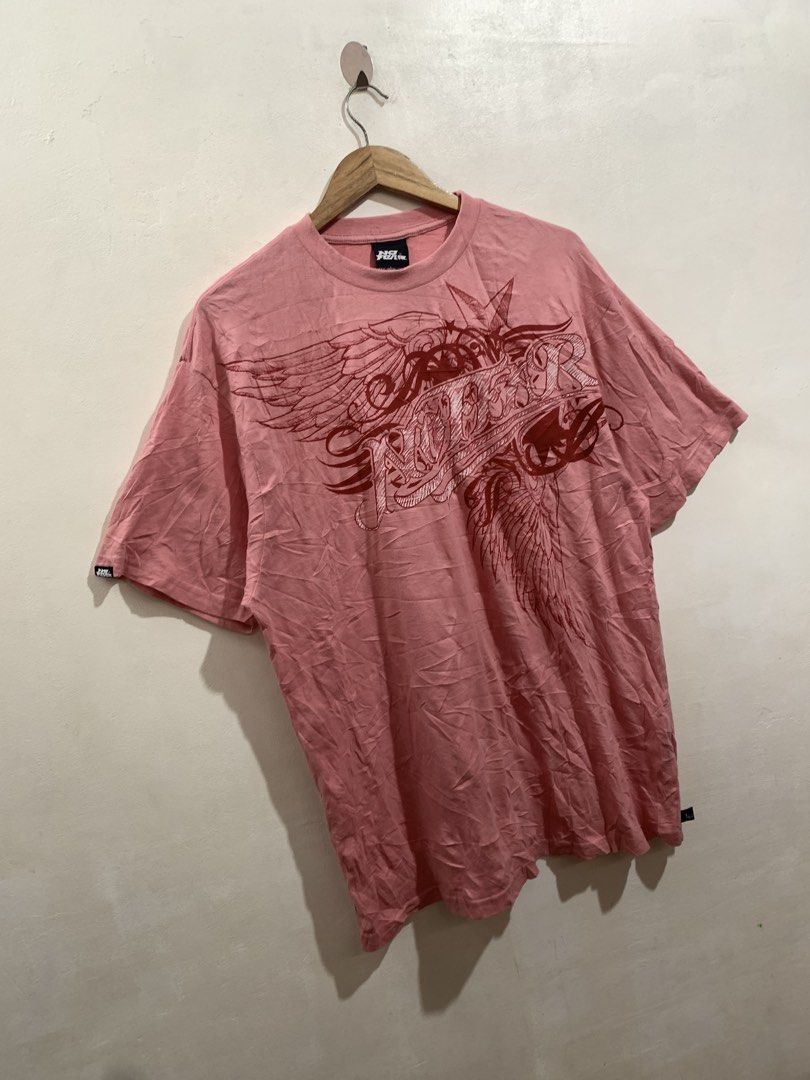 Y2K NO FEAR TEE (Category: Tshirts & Polo Shirts ) located in Gumaca. Submitted by getscore.ph (Listing ID 1468557665, Image 2). Description: WTS ❗️Y2K NO FEAR TEE❗️ ✅Size: L on tag ✅Dimes: Width 22.5 Length 30 ✅Color Rate: 9.5/10 ✅Condition: Excellent ✅Issue: Mone Color may due to lightning FRESH FROM BALE GUSOT PA NEED WASH 🫧💦 Mura lang DM ME TO PURCHASE 📥📥 📍Loc. Gumaca,Quezon 📍Courier: JNT EXPRESS.