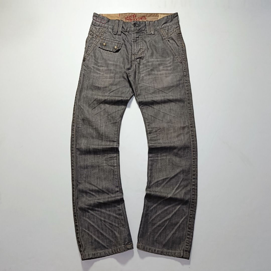 Y2K Tough Jeans Washed Black Denim (Category: Jeans) located in Taytay. Submitted by hoodgrail.vtg (Listing ID 1468627100, Image 1). Description: • Good condition - Lightly used • Distinctive washed black denim with contrast stitching and utility-style front pocket • Size on tag: 31 — best fits W30 • Measurements: 15.5 x 42.5 in • Leg opening: 8 in • Color rate: 9/10 • Issue: None.