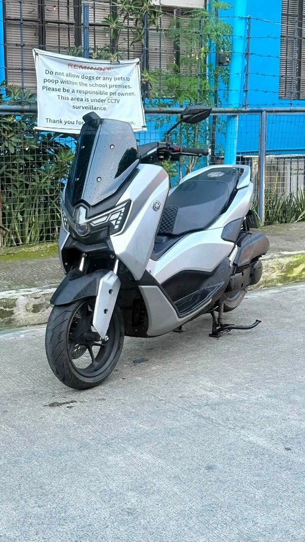Yamaha NMAX V3 STD 2025 (Category: Motorbikes for Sale) located in Makati City. Submitted by tunying.001 (Listing ID 1468669957, Image 1). Description: FOR SALE NMAX V3 STD 2025 1 Remote key with redcode 8,100 running odo BiLed AES Headlight +2 engine support on pic (Back to stock size now) Arvie creations flat seat (BosMel Seat Now) 305mm shock with baso Registered til 2028 Complete papers 2valid id’s with open dos Ready to transfer ownership Lo