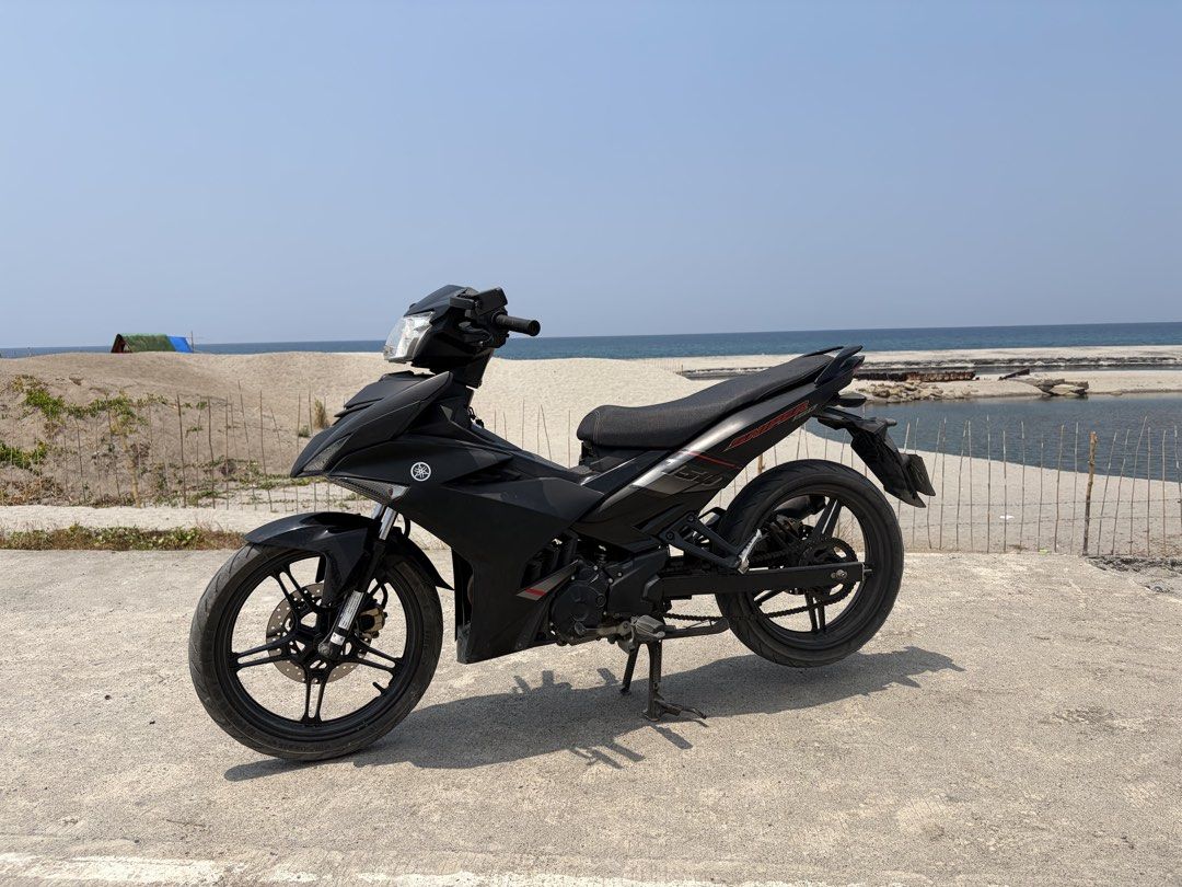 Yamaha Sniper 150 Motorcycle (Category: Motorbikes for Sale) located in Marikina City. Submitted by pong15 (Listing ID 1468592725, Image 1). Description: Yamaha Sniper 150 underbone motorcycle in matte black. Manual transmission with standard foot controls and center stand. Comes paired with matching black alloy wheels and disc brakes front and rear. Handlebar mirrors equipped on both sides. Body panels clean with red accents near the rear tail s