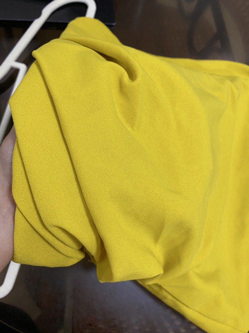 Yellow tube top (Category: Sleeveless) located in Los Banos. Submitted by itsmecathey (Listing ID 1468693039, Image 2). Description: See last photo for original price Super nice top and quality. Pls see issue on 5th photo. Fit 34 bust (S-M).