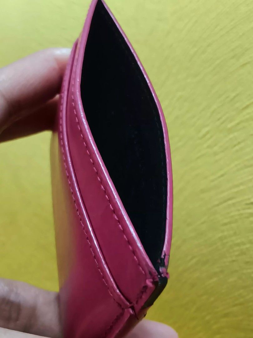 YSL card holder (Category: Wallets & Card holders) located in Pasay City. Submitted by secretas (Listing ID 1468529640, Image 3). Description: got this in Japan. selling it a low price with booklet abd card. original po yan. yon rubber lang sa edge na bakbak. slight lang naman.