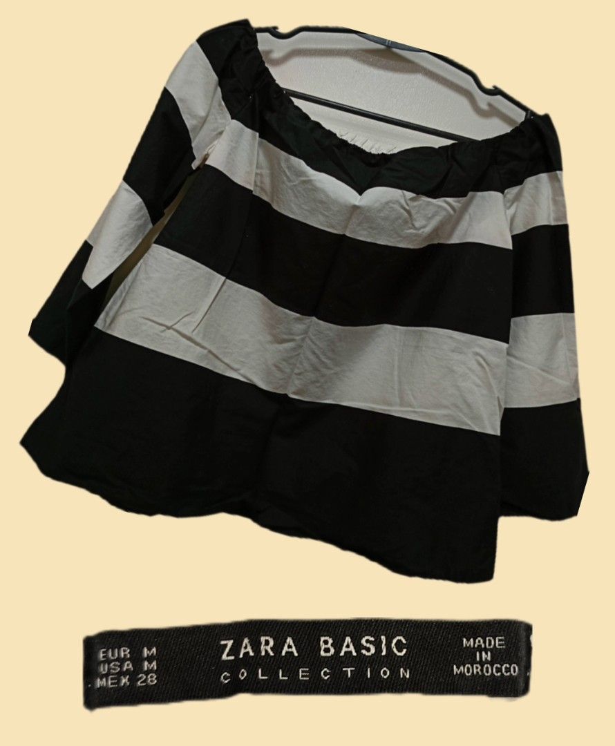 Zara Basic Collection Black and White Striped Off-the-Shoulder Blouse. (Category: Longsleeves) located in Manila. Submitted by elyseva.356 (Listing ID 1468596526, Image 2). Description: Condition: Well Used Size: Medium SP: 150 fixed RFS: Stocked lang Can be delivered through LBC/J&T but the buyer will shoulder the SF. .