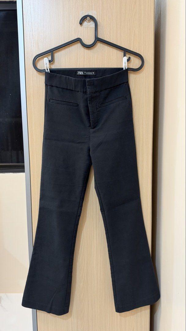 Zara Black Flare Trousers (Category: Jeans) located in Quezon City. Submitted by declutterw_v (Listing ID 1468681568, Image 1). Description: - Brand: Zara - Size: XS - Color: Black - Style: Flare trousers with structured fit and waist pockets - Condition: Clean design, great basic piece - Versatility: Perfect for casual days or office wear, easy to match with any top.