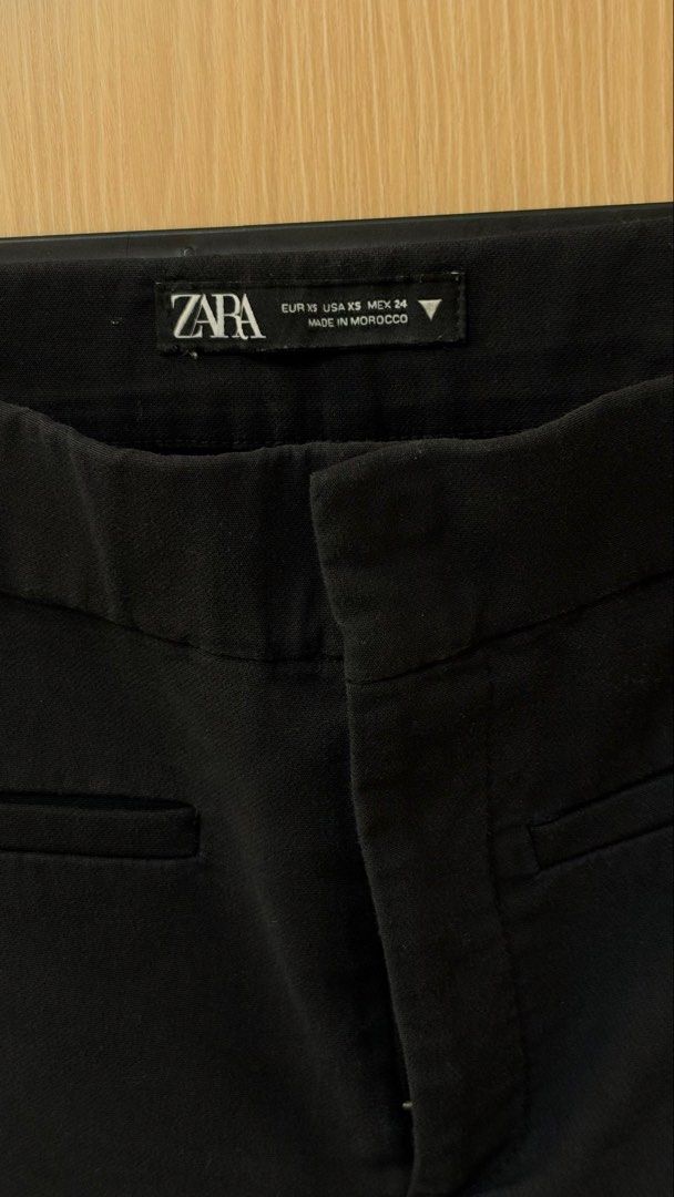 Zara Black Flare Trousers (Category: Jeans) located in Quezon City. Submitted by declutterw_v (Listing ID 1468681568, Image 2). Description: - Brand: Zara - Size: XS - Color: Black - Style: Flare trousers with structured fit and waist pockets - Condition: Clean design, great basic piece - Versatility: Perfect for casual days or office wear, easy to match with any top.