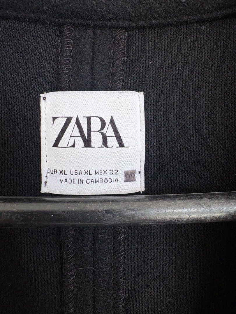 ZARA Black Long Coat Size XL (Category: Coats, Jackets and Outerwear) located in Pasig City. Submitted by marias_wardrobe (Listing ID 1468508903, Image 3). Description: - Brand: Zara - Size: XL (EUR, USA, MEX) - Color: Black - Style: Long coat with classic lapels and single front button closure - Origin: Made in Cambodia - Condition: Great for cooler weather layering - DM to order or for inquiries!.