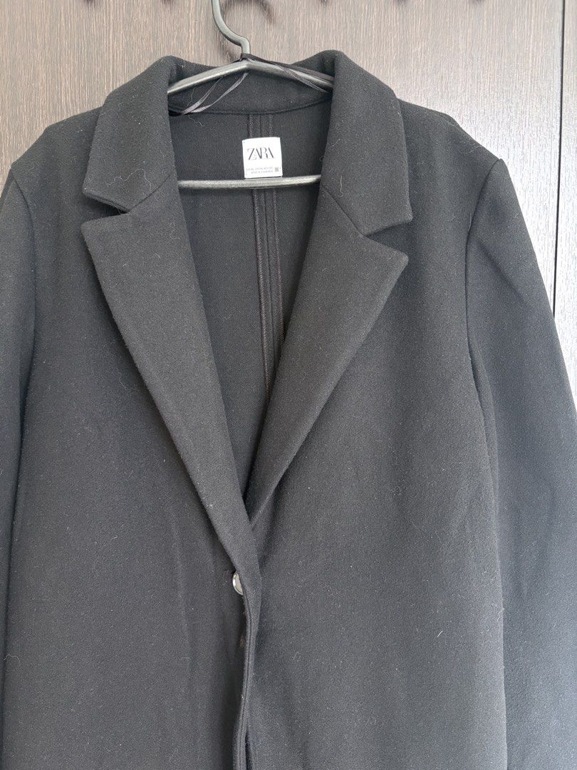 ZARA Black Long Coat Size XL (Category: Coats, Jackets and Outerwear) located in Pasig City. Submitted by marias_wardrobe (Listing ID 1468508903, Image 2). Description: - Brand: Zara - Size: XL (EUR, USA, MEX) - Color: Black - Style: Long coat with classic lapels and single front button closure - Origin: Made in Cambodia - Condition: Great for cooler weather layering - DM to order or for inquiries!.