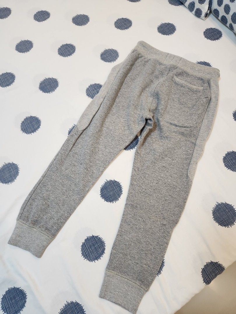 Zara Boys Grey Jogger Sweatpants Size 7 (Category: Babies & Kids Fashion) located in Taguig. Submitted by rheannataberna (Listing ID 1468653065, Image 3). Description: - Color: Grey - Material: Soft knit cotton - Waist: Elastic waistband with adjustable black drawstring - Cuffs: Ribbed ankle cuffs for a secure fit - Pockets: Functional front pockets - Versatile: Great for school, play, or lounging at home - Easy to pair with any t-shirt or hoodie