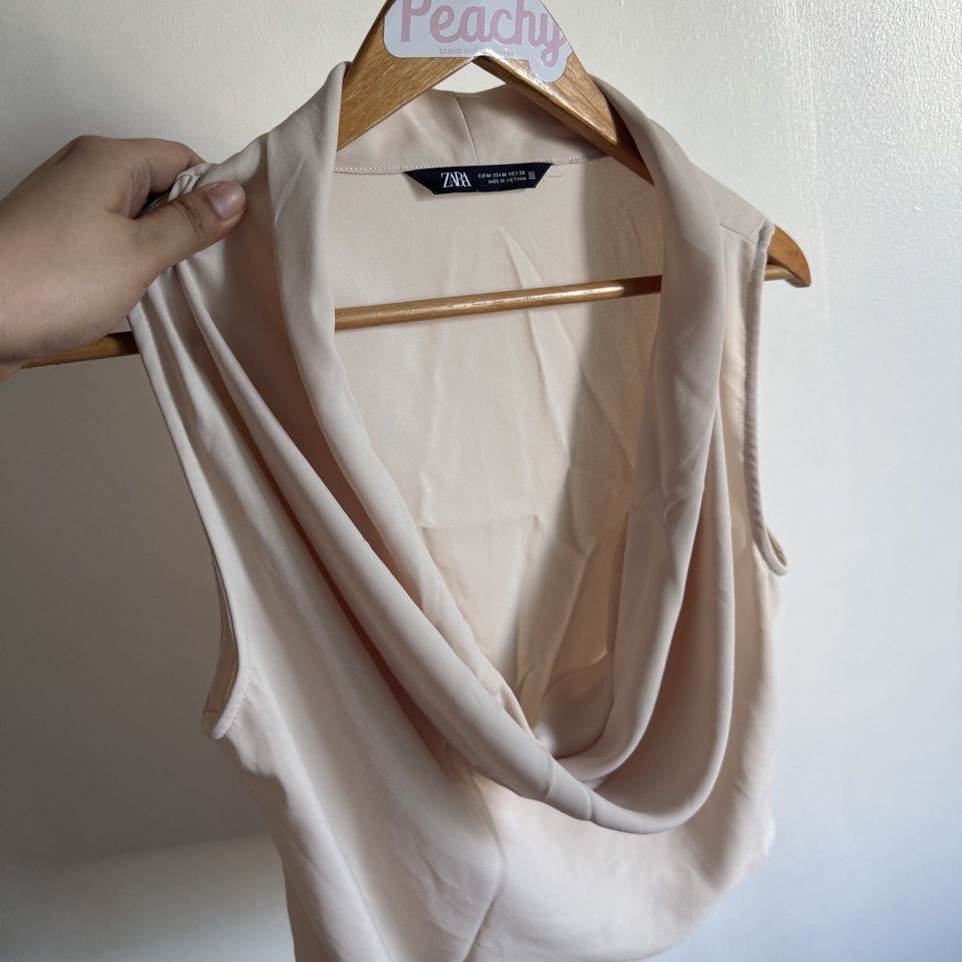 Zara cowlneck (Category: Blouses) located in Manila. Submitted by apparella.ph (Listing ID 1468575726, Image 3). Description: 10/10 super pretty lakas makayaman Bust:44 Length:20 ☑️Everything is my Own preloved / BNWT/BNWOT ☑️ not thrifted/Ukay ☑️ malukot sa picture kasi na stock sa cabinet (tinatamad mag plantsa ✌️ ) ☑️Personal items ( usually bought in US/UK/JPN ) every year po ako nag aabroad so expect i don’t sell fake items and mejo pricey ☑