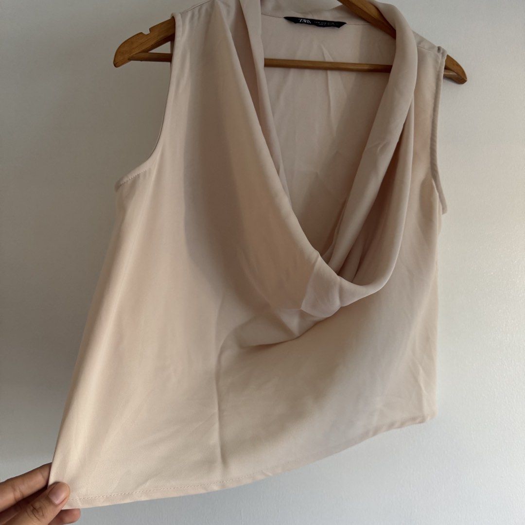 Zara cowlneck (Category: Blouses) located in Manila. Submitted by apparella.ph (Listing ID 1468575726, Image 2). Description: 10/10 super pretty lakas makayaman Bust:44 Length:20 ☑️Everything is my Own preloved / BNWT/BNWOT ☑️ not thrifted/Ukay ☑️ malukot sa picture kasi na stock sa cabinet (tinatamad mag plantsa ✌️ ) ☑️Personal items ( usually bought in US/UK/JPN ) every year po ako nag aabroad so expect i don’t sell fake items and mejo pricey ☑