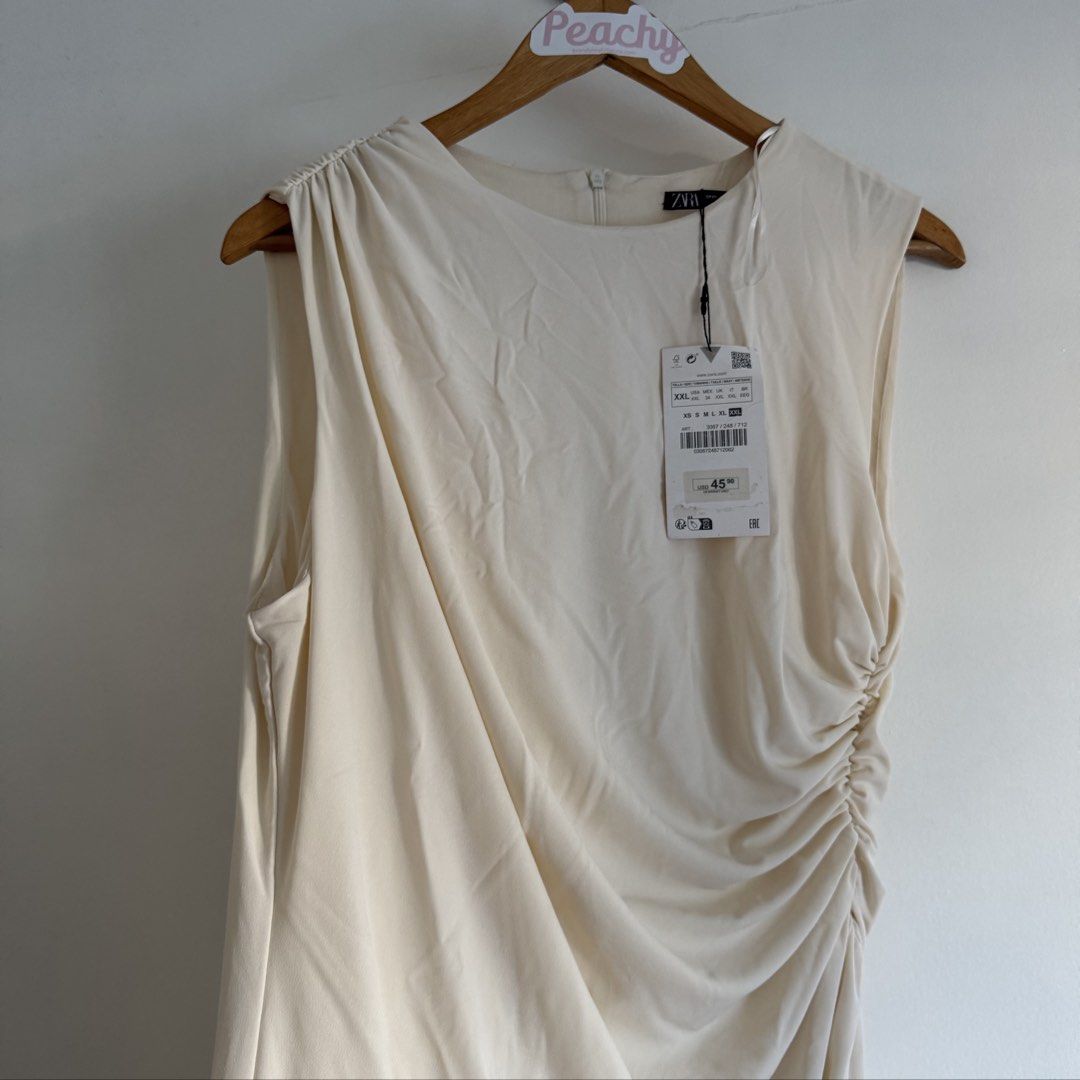 Zara dress (Category: Dresses) located in Manila. Submitted by apparella.ph (Listing ID 1468503447, Image 3). Description: Xxl on tag fits -2xl. Needs iron lang to appreciate:) Bnwt super pretty and nakakasexy natatakpan ang tummy dahil sa design Bust:42 Waist:36( best fit para d msydo fitted sa tummy area ) Length:39 ☑️Everything is my Own preloved / BNWT/BNWOT ☑️ not thrifted/Ukay ☑️ malukot sa picture kasi na stock sa cabinet (tinatamad mag pl