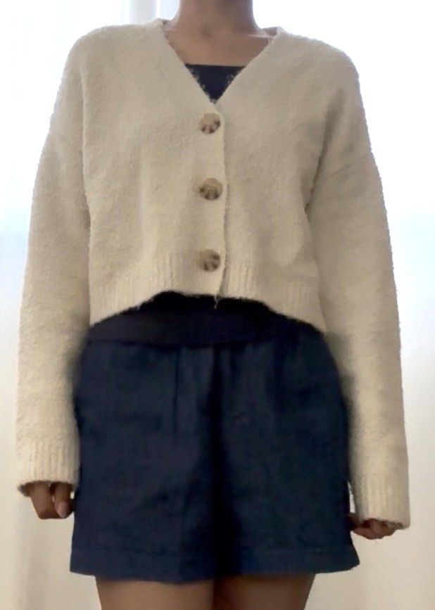 Zara Fluffy Cardigan in Cream (Category: Coats, Jackets and Outerwear) located in Mandaluyong City. Submitted by trishi.trish (Listing ID 1468568302, Image 3). Description: - Swipe to see when worn photos - In great condition - Material: Soft, fluffy fleece-like knit texture - Design: V-neck with 3 tortoiseshell-style front buttons, cropped fit, ribbed cuffs and hem - Original Price: 2395 I’m 5ft 3”, 32” bust and usually a size XS-S. Sizes when l