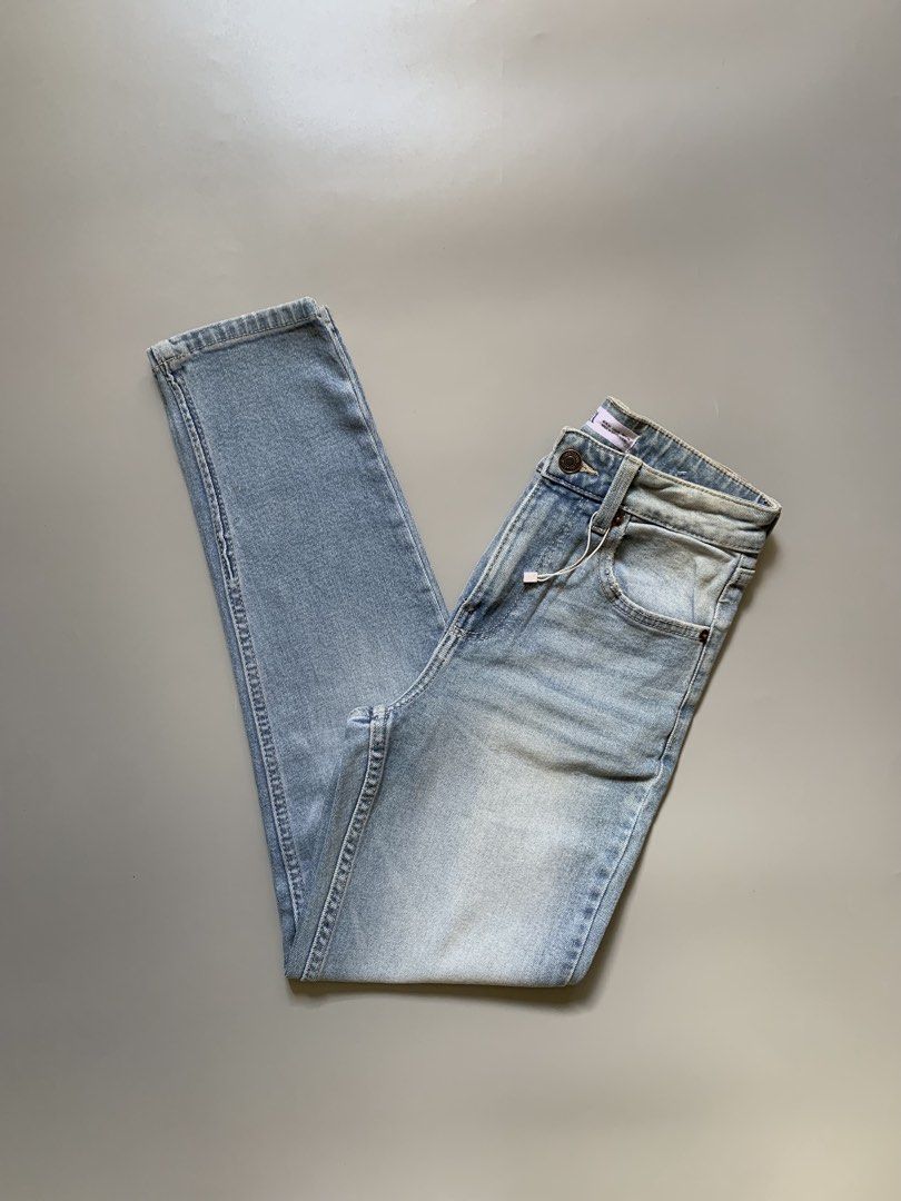 Zara Light Wash Denim Jeans (Category: Jeans) located in Manila. Submitted by swift_royalfox.18 (Listing ID 1468660012, Image 1). Description: - Brand: Zara - Condition: Brand new with tags attached - Size: EU 34 / USA 02 - Color/Wash: Light wash with faded detailing on front and back - Fit: Classic straight leg - Features: Five-pocket style, button closure, belt loops, and ZARA leather patch on back waistband - Origin: Made in Bangladesh.