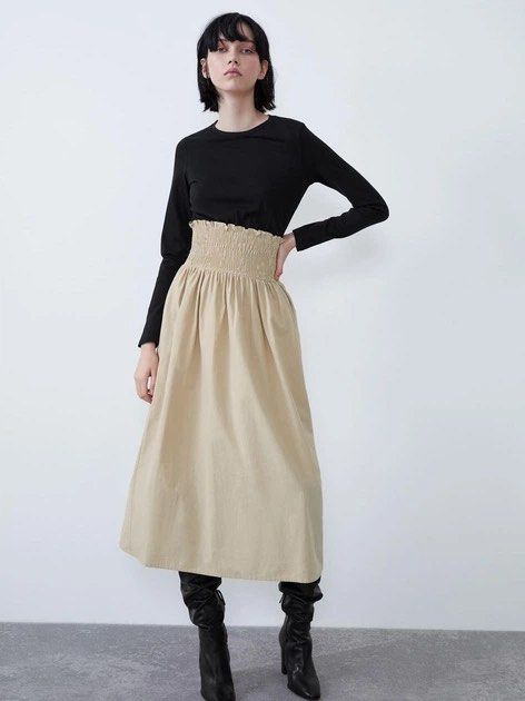 Zara Maxi Dress (Category: Dresses) located in Malolos. Submitted by eadiana (Listing ID 1468573646, Image 1). Description: - Brand: Zara - Style: Two-tone long sleeve midi dress - Color: Black fitted top and khaki beige pleated skirt - Details: Crew neckline, smocked elastic waist with ruffled trim - Size: S - Origin: Made in Morocco - Fit: Pullover style, super comfortable and easy to wear for casual outings.