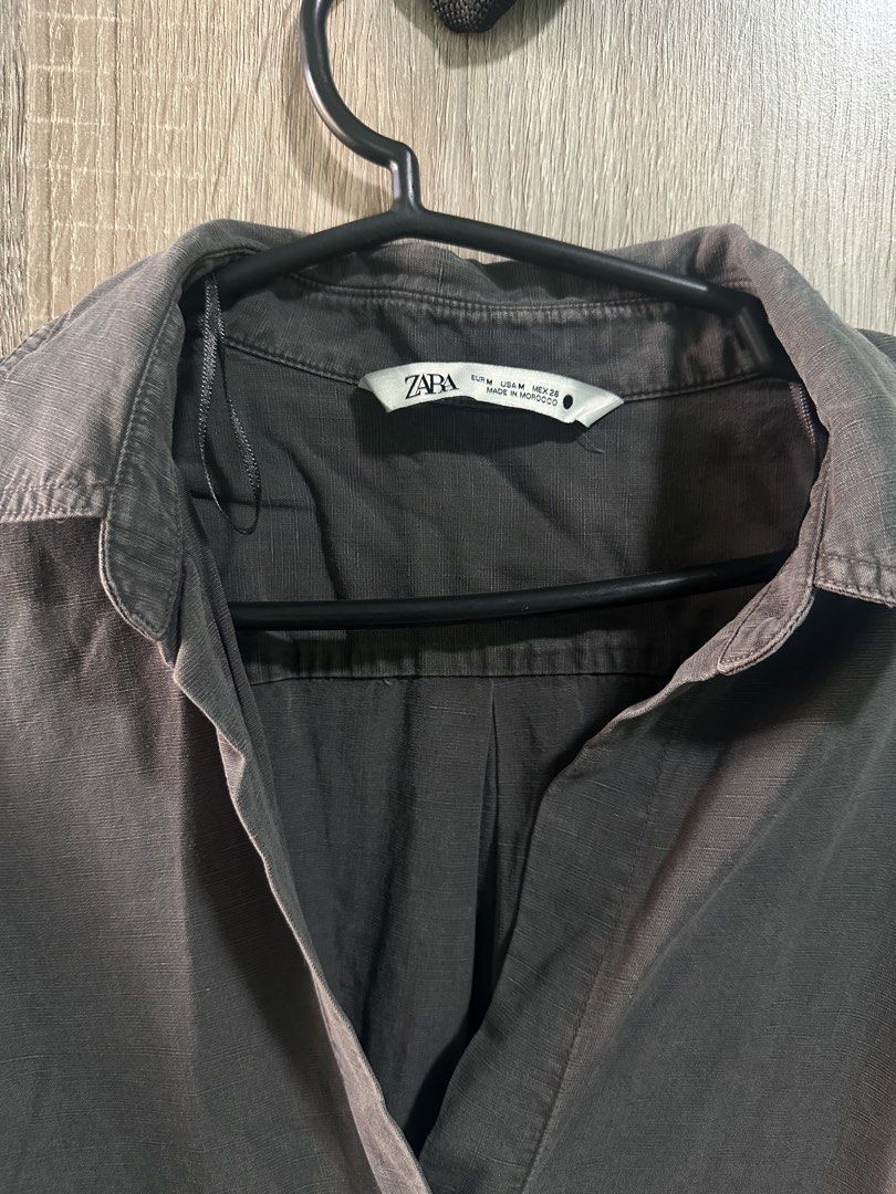 Zara Oversized Polo Shirt (Category: Shirts) located in Manila. Submitted by love.lyxph (Listing ID 1468580194, Image 2). Description: Zara grey/charcoal oversized lightweight long-sleeve or 3/4-sleeve button-down shirt.