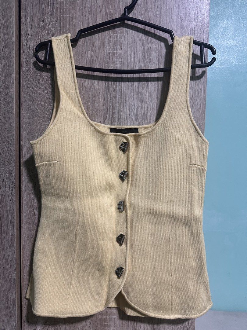 Zara Top (Category: Sleeveless) located in Manila. Submitted by love.lyxph (Listing ID 1468632403, Image 2). Description: Zara Metal Button Knitted Top.