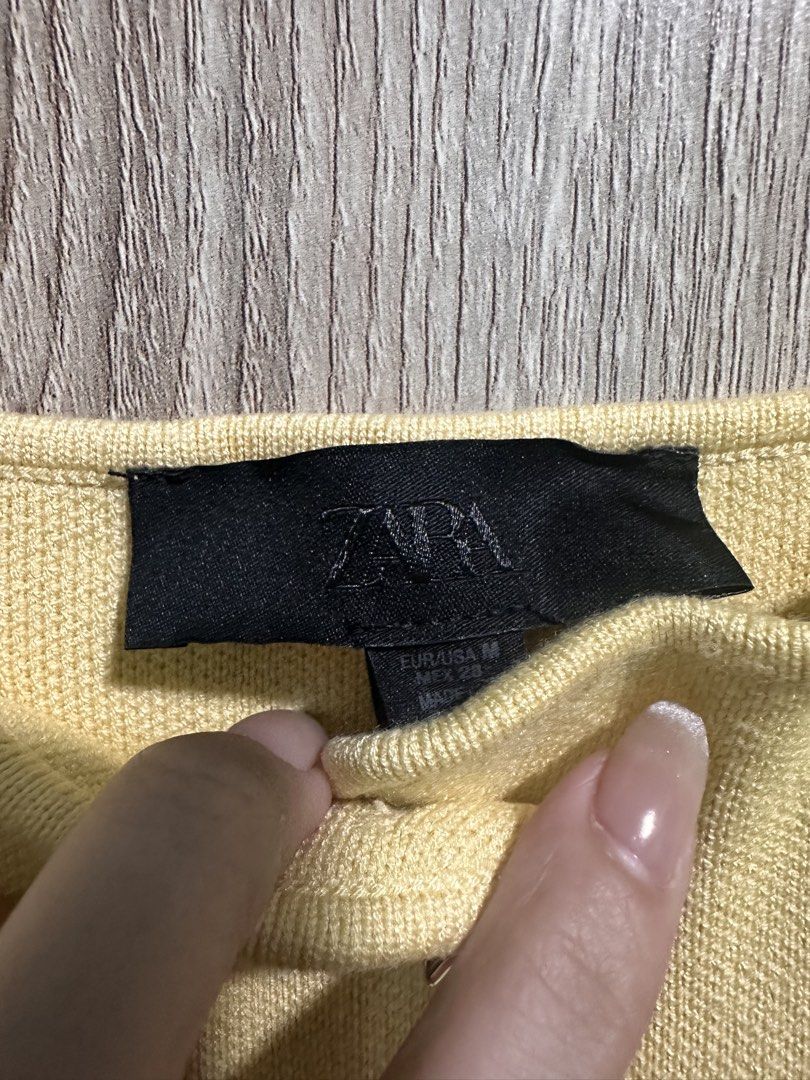 Zara Top (Category: Sleeveless) located in Manila. Submitted by love.lyxph (Listing ID 1468632403, Image 3). Description: Zara Metal Button Knitted Top.