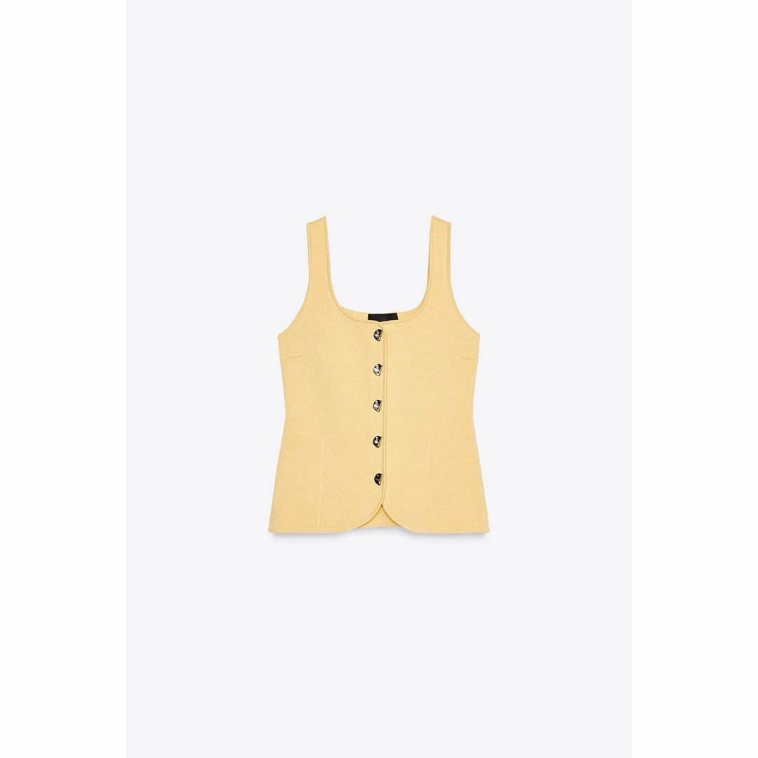 Zara Top (Category: Sleeveless) located in Manila. Submitted by love.lyxph (Listing ID 1468632403, Image 1). Description: Zara Metal Button Knitted Top.