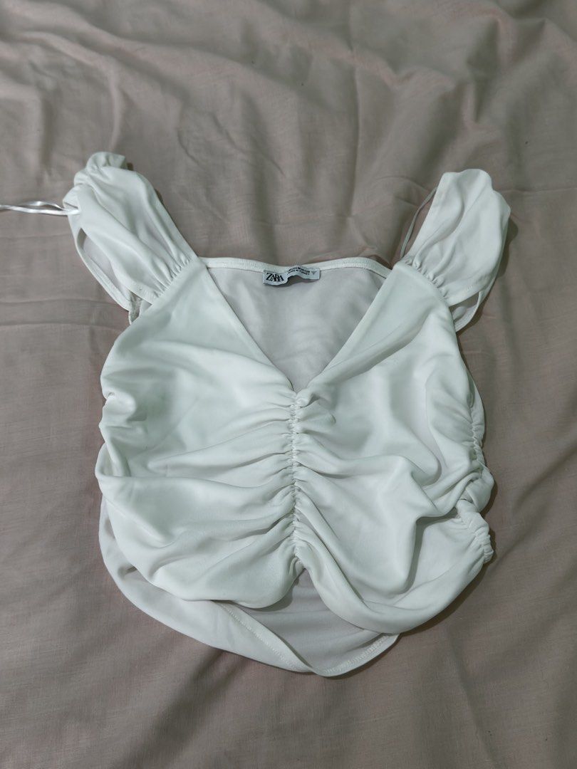 Zara tops (Category: Blouses) located in Quezon City. Submitted by pinkpreloved08 (Listing ID 1468527743, Image 2). Description: 2 zara 1 different brand Small- medium 220 each .