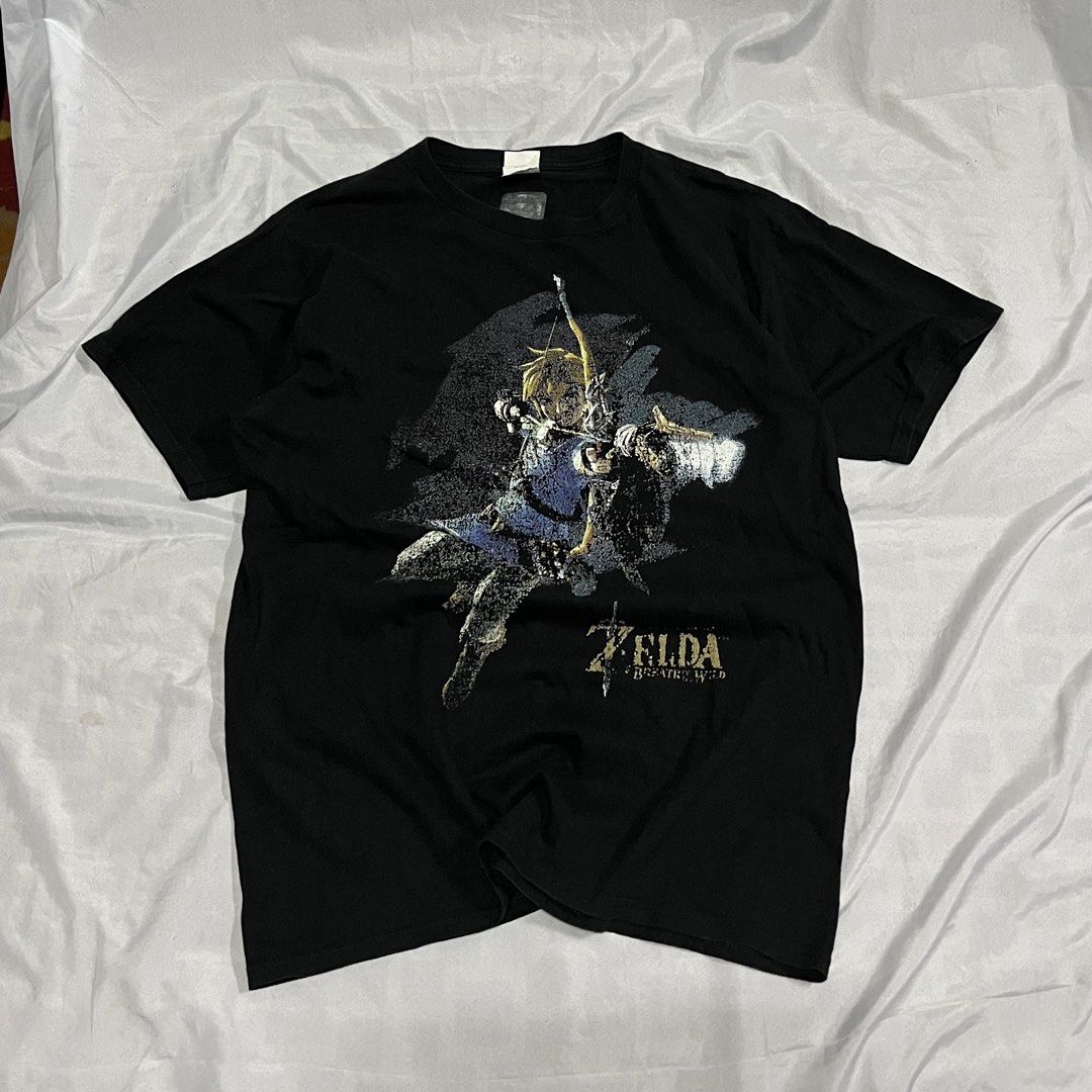 Zelda Merch Graphic Shirt Black (Category: Tshirts & Polo Shirts ) located in Muntinlupa City. Submitted by ninenine.collective (Listing ID 1468500875, Image 1). Description: Zelda Merch Graphic Shirt Black 20.5/28.