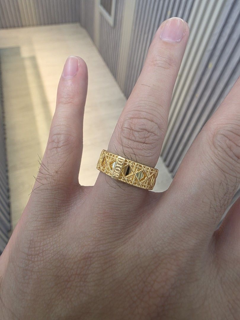18k Dior Cannage Gold Ring (Category: Rings) located in Manila. Submitted by trumpisthedevil (Listing ID 1468844899, Image 1). Description: - Brand: Dior - Design: Classic cannage pattern with intricate textured cut-out design - Details: Embossed DIOR lettering on the front band - Size: 4.5 (tag attached) - Finish: High-shine, clean inside band - Condition: Pristine, well-maintained.