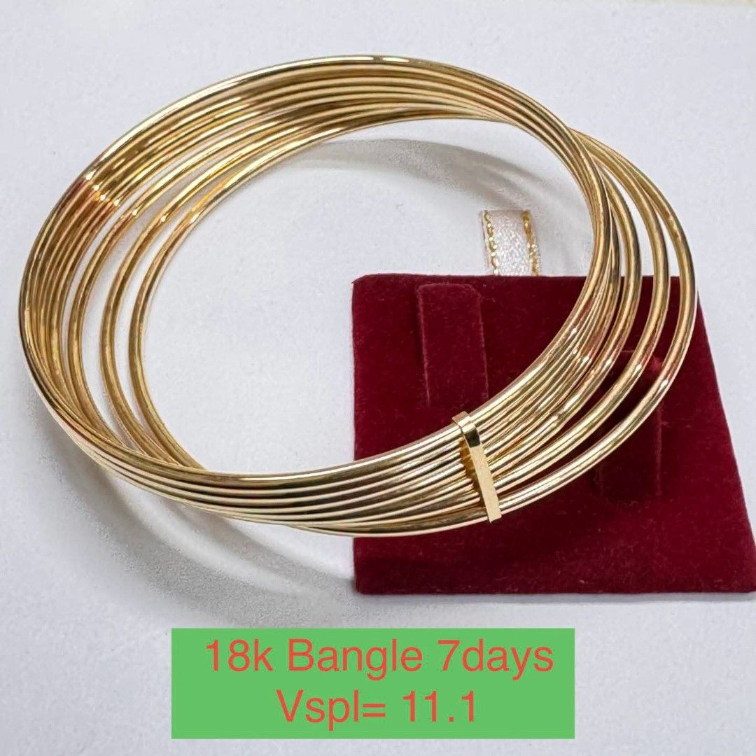 18k Gold 7 Days Bangle 11.1 grams (Category: Bracelets) located in Marikina City. Submitted by jhem.andcojewelry (Listing ID 1468714193, Image 1). Description: - Material: Authentic 18k Solid Gold - Weight: 11.1 grams - Design: Classic 7-day stacked bangle connected with a small spacer bar - Finish: Beautiful polished finish - Condition: Brand new and high quality - Perfect for daily wear or gifting.