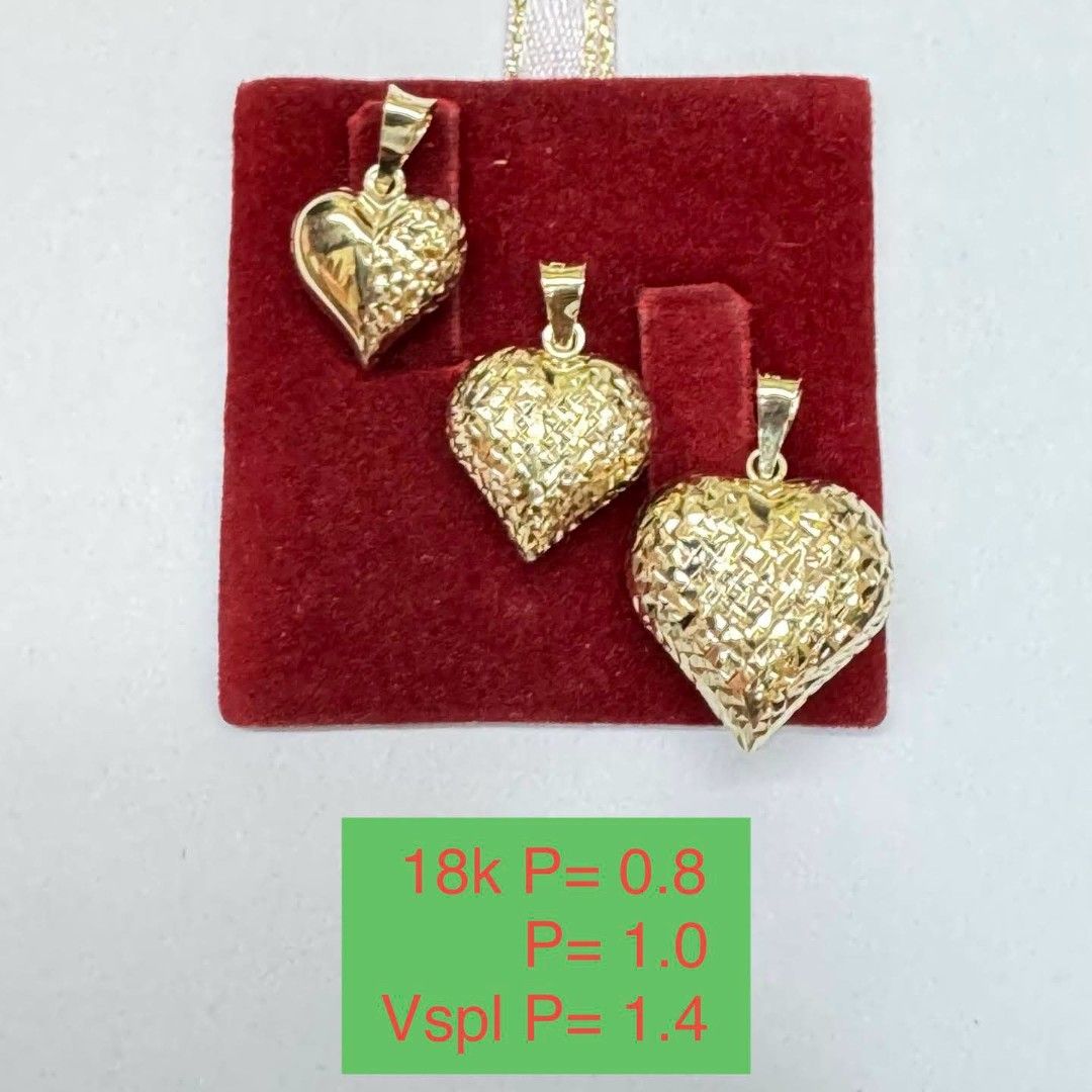 18k Gold Heart Pendant Set (Category: Necklaces) located in Marikina City. Submitted by emmstaule (Listing ID 1468713288, Image 1). Description: - Material: Authentic 18k yellow gold - Set of 3 stunning heart pendants - Finishes: Textured diamond-cut and half-smooth design - Sizes included: 0.8, 1.0, and Vspl P 1.4 - Condition: Brand new, displayed on a red velvet pad - Mode of Payment: GCash, BPI, or Bank Transfer - Shipping: via J&T Express or 