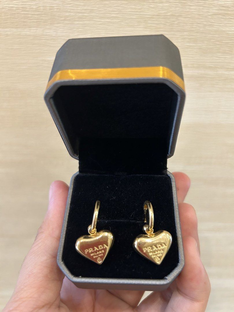 18k gold prada heart earrings (Category: Body Jewelry) located in San Juan City. Submitted by bettyonnng (Listing ID 1468732122, Image 1). Description: 18k gold dangling prada earrings ✨ around 3grams Dm for sure buyer Loc: Dasma/Qc 0.