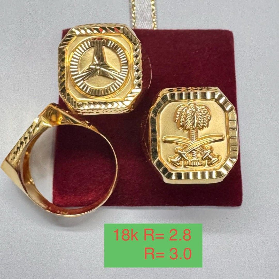18k Gold Ring with Emblem Design (Category: Rings) located in Marikina City. Submitted by jhem.andcojewelry (Listing ID 1468713645, Image 1). Description: - Material: Solid 18k gold - Designs: Mercedes-Benz star motif and Saudi Arabia national emblem (palm tree and crossed swords) - Features: Heavy textured borders - Sizes: 2.8 and 3.0 - Availability: Selling as a set or individually - Inquiries: Message for pricing and details.